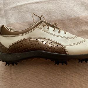 Unique and stylish ladies Footjoy golf shoes, spikes, size 7.5, cream and copper